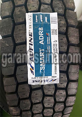 Aufine ADR8 Smart (приводная) 315/80 R22.5 156/150L 20PR - Фото протектора с этикеткой вблизи